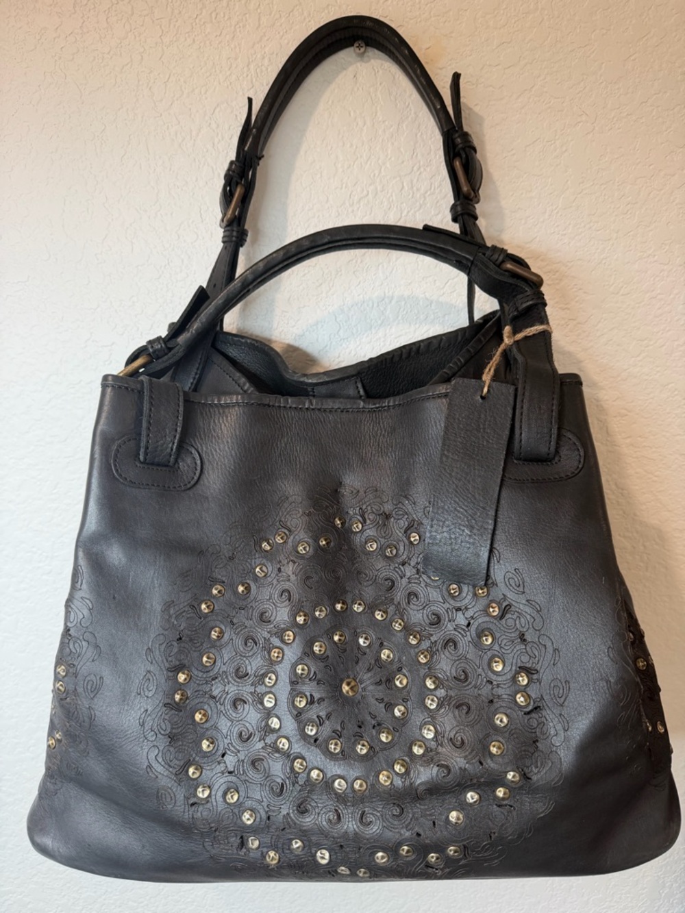 Platania Grained Leather Studded Floral Cut Out Slouch Top Handle Handbag